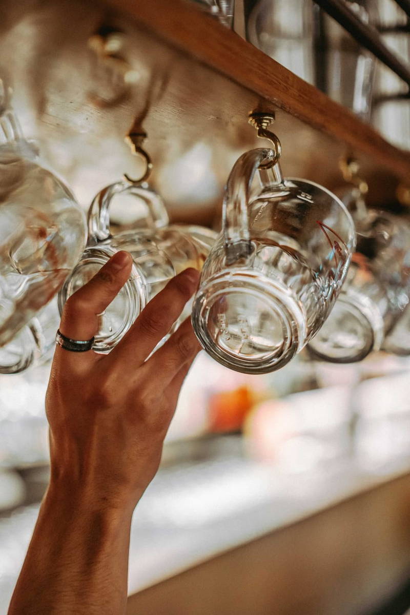 Glassware being set before service.